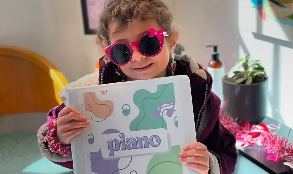 girl-with-piano-book